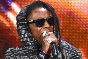 LOS ANGELES, CA - NOVEMBER 23: Recording artist Lil Wayne performs onstage at the 2014 American Music Awards at Nokia Theatre L.A. Live on November 23, 2014 in Los Angeles, California. (Photo by Kevin Winter/Getty Images)