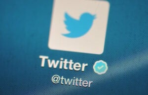 The Twitter logo displayed on a mobile device