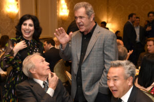 sue-kroll-clint-eastwood-mel-gibson-kevin-tsujihara-getty-images