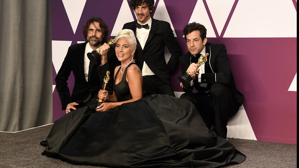 Andrew Wyatt, Anthony Rossomando, Lady Gaga, and Mark Ronson, winners of Best Original Song for "Shallow" from "A Star is Born," pose in the press room during the 91st Annual Academy Awards at Hollywood and Highland on February 24, 2019