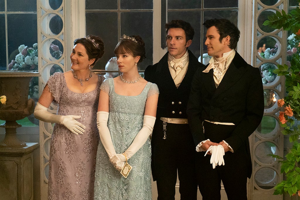 Ruth Gemmell as Lady Violet Bridgerton, Claudia Jessie as Eloise Bridgerton, Jonathan Bailey as Anthony Bridgerton, and Luke Thomspon as Benedict Bridgerton in "Bridgerton" Season 2 (Liam Daniel/Netflix)