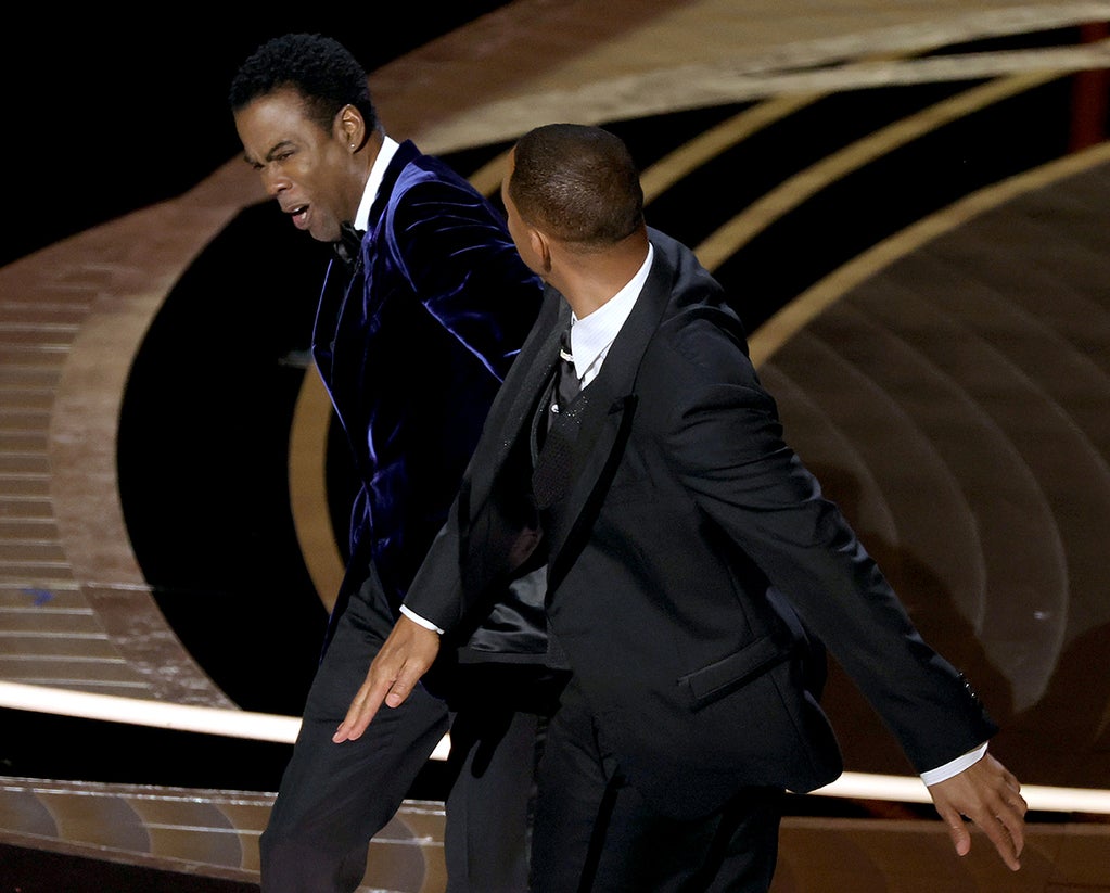 Chris Rock and Will Smith are seen onstage during the 94th Annual Academy Awards at Dolby Theatre on March 27, 2022 (Getty Images)