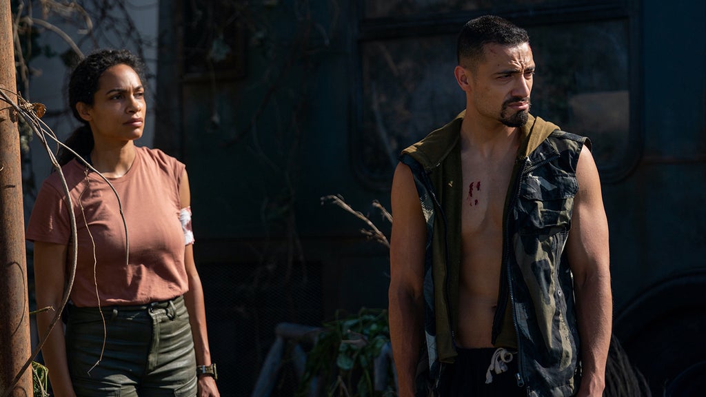 Rosario Dawson and Freddy Miyares in "DMZ" (HBO Max)