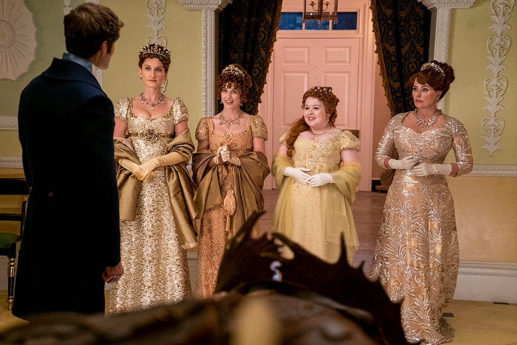 Rupert Young as Lord Jack Featherington, Bessie Carter as Prudence Featherington, Harriet Cains as Philipa Featherington, Nicola Coughlan as Penelope Featherington, Polly Walker as Lady Portia Featherington in episode 201 of "Bridgerton" Season 2 (Liam Daniel/Netflix)
