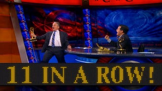 Stephen Colbert Rubs His Emmys in Jon Stewart’s Face (Video)