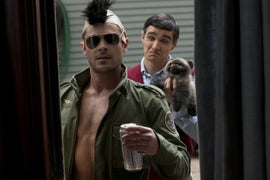 Zac Efron, Dave Franco Ruin Seth Rogen and Rose Byrne’s Lives in ‘Neighbors’ Trailer (Video)