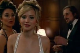 Jennifer Lawrence Isn’t Scared, She Just Wants a Drink in New ‘American Hustle’ Spot (Video)