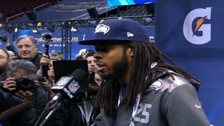 Super Bowl Media Day: Richard Sherman Deflects, Peyton Manning Passes and Marshawn Lynch Fouls on Live TV (Video)