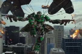 Super Bowl: Mark Wahlberg Runs, a Dinobot Rampages in ‘Transformers: Age of Extinction’ Trailer (Video)