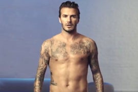 Super Bowl: David Beckham Strips Down for H&M (Video)