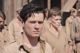 Jack O’Connell Gets Shot Down and Captured in Newest Trailer for Angelina Jolie’s ‘Unbroken’ (Video)