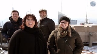 Watch Jimmy Fallon and Jon Hamm Hilariously Photobomb Tourists at 30 Rock (Video)