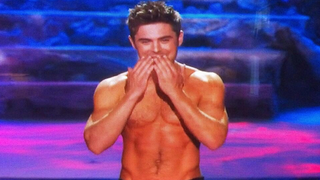 Watch Zac Efron Get His Shirt Torn Off at the MTV Movie Awards (Video)