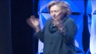 Hillary Rodham Clinton Dodges a Shoe Thrown by Heckler (Video)