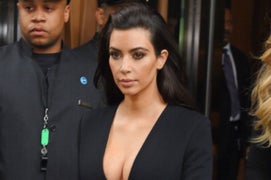 Kim Kardashian Sues Website for Suggesting She Faked Her Robbery