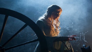 Elle Fanning Pricks Her Finger on Spinning Wheel as Angelina Jolie Rides in ‘Malifecent’ Clip (Video)