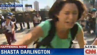 CNN Reporter Hit by Tear Gas During Live Broadcast of World Cup Protest (Video)