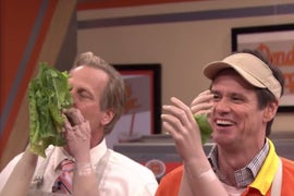 Jim Carrey and Jeff Daniels Serve Cheeseburger and Fries With Fake Arms (Video)