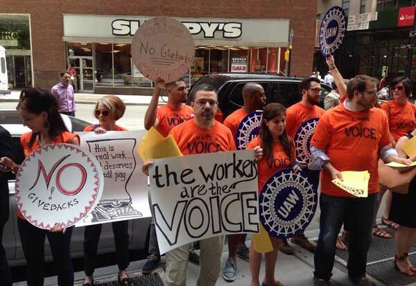 Village Voice staffers stage a lunchtime protest on Monday