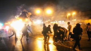 U.S. Attorney General Orders Federal Autopsy on Michael Brown, as Ferguson Protests Leave 1 Shot