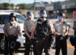 Police in riot gear watch over a protest in Ferguson, Missouri, Aug. 13, 2014 (Getty Images)