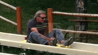 Harrison Ford Takes His Bad Leg Out for a Slide
