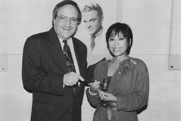 July 1995: SAG president Barry Gordon hands the gavel to Sumi Haru who became interim president of SAG following his resignation.