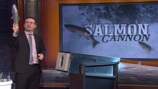 John Oliver’s Salmon Cannon Drills Tom Hanks, JJ Abrams, Jon Stewart  – And Pretty Much Everyone Else (Video)