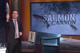 John Oliver’s Salmon Cannon Drills Tom Hanks, JJ Abrams, Jon Stewart – And Pretty Much Everyone Else (Video)