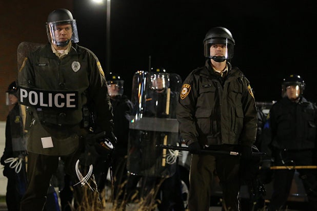 FERGUSON, MO - NOVEMBER 24: St. Louis County police officers in riot gear stand guard in front of the Ferguson police department after a grand jury's decision was delivered on November 24, 2014 in Ferguson, Missouri. A St. Louis County grand jury has decided to not indict Ferguson police Officer Darren Wilson in the shooting of Michael Brown that sparked riots in Ferguson, Missouri in August. (Photo by Justin Sullivan/Getty Images) FERGUSON, MO - NOVEMBER 24: St. Louis County police officers in riot gear stand guard in front of the Ferguson police department after a grand jury's decision was delivered on November 24, 2014 in Ferguson, Missouri. A St. Louis County grand jury has decided to not indict Ferguson police Officer Darren Wilson in the shooting of Michael Brown that sparked riots in Ferguson, Missouri in August. (Photo by Justin Sullivan/Getty Images)