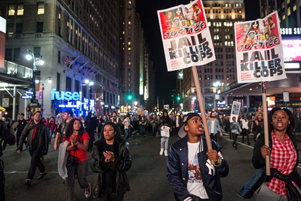 NEW YORK, NY - NOVEMBER 24: Protesters march through the streets of New York after learning at police officer Darren Wilson, of the Ferguson, MO police department, who fatally shot teenager Michael Brown on August 9, would not be indicted by a grand jury on November 24, 2014 in New York City. The killing of Michael Brown inspired mass protests in the St. Louis suburb for over a month and has reignited conversations throughout the nation about race and police force. (Photo by Andrew Burton/Getty Images) NEW YORK, NY - NOVEMBER 24: Protesters march through the streets of New York after learning at police officer Darren Wilson, of the Ferguson, MO police department, who fatally shot teenager Michael Brown on August 9, would not be indicted by a grand jury on November 24, 2014 in New York City. The killing of Michael Brown inspired mass protests in the St. Louis suburb for over a month and has reignited conversations throughout the nation about race and police force. (Photo by Andrew Burton/Getty Images)