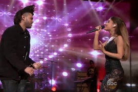 Ariana Grande Lets Hair Down for Jazzy AMAs Mashup With The Weeknd (Video)