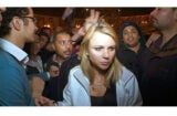 CBS's Lara Logan on assignment in Egypt the day of her attack, Feb. 11, 2011