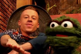 Macklemore and Oscar the Grouch Parody ‘Thrift Shop’ for ‘Sesame Street’ (Video)