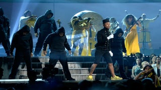 Grammys: Pharrell Throws Up Ferguson Gesture During ‘Happy’ Performance (Video)