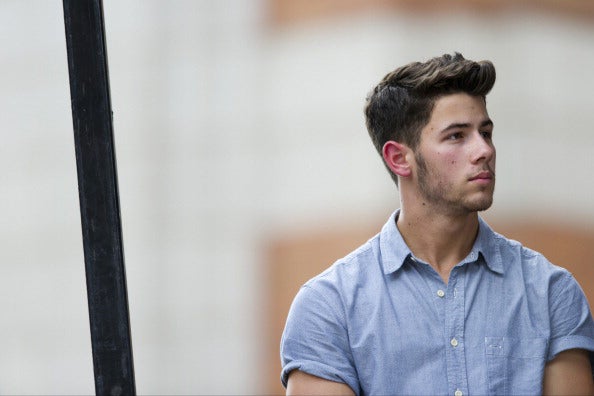 2013 - Nick Jonas at Kidd Kraddick Public Memorial (Cooper Neill/Getty Images)