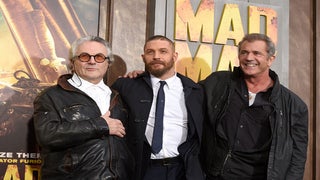 Mel Gibson Drops in on Tom Hardy at ‘Mad Max: Fury Road’ Los Angeles Premiere (Photos)