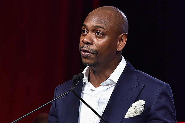 WATER MILL, NY - JULY 18: Dave Chappelle speaks on stage as RUSH Philanthropic Arts Foundation Celebrates 20th Anniversary at Art For Life sponsored by Bombay Sapphire Gin at Fairview Farms on July 18, 2015 in Water Mill, New York. (Photo by Eugene Gologursky/Getty Images for Bombay Sapphire Gin) WATER MILL, NY - JULY 18: Dave Chappelle speaks on stage as RUSH Philanthropic Arts Foundation Celebrates 20th Anniversary at Art For Life sponsored by Bombay Sapphire Gin at Fairview Farms on July 18, 2015 in Water Mill, New York. (Photo by Eugene Gologursky/Getty Images for Bombay Sapphire Gin)