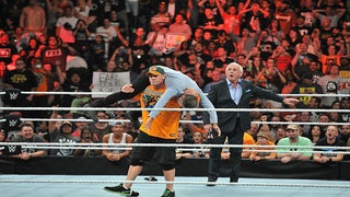 Jon Stewart Gets Taken Down by John Cena on WWE’s ‘Monday Night Raw’ (Video)