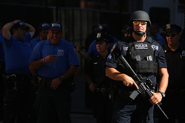 NEW YORK, NY - SEPTEMBER 24: Police stand watch outside St. Patrick's Cathedral awaiting the arrival of Pope Francis September 24, 2015 in New York City. Maryland.The pope is on a six-day visit to the U.S., with stops in Washington, New York City and Philadelphia. (Photo by Damon Winter-Pool/Getty Images) NEW YORK, NY - SEPTEMBER 24: Police stand watch outside St. Patrick's Cathedral awaiting the arrival of Pope Francis September 24, 2015 in New York City. Maryland.The pope is on a six-day visit to the U.S., with stops in Washington, New York City and Philadelphia. (Photo by Damon Winter-Pool/Getty Images)