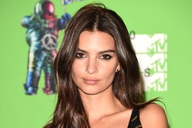 Emily Ratajkowski Clarifies Who REALLY Holds Her Boobs Against Her