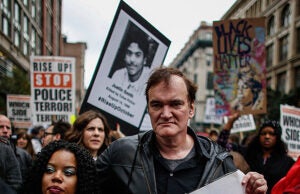 NEW YORK, NY - OCTOBER 24: Director Quentin Tarantino attends a march to denounce police brutality in Washington Square Park October 24, 2015 in New York City. The rally is part of a three-day demonstration against officer-involved abuse and killing. (Photo by Kena Betancur/Getty Images)