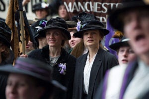In this image released by Focus Features, Anne-Marie Duff portrays Violet Miller, left, and Carey Mulligan portrays Maud Watts in a scene from "Suffragette." (Steffan Hill/Focus Features via AP)