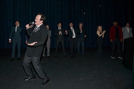 Quentin Tarantino Delivers Shrieking UFC-Style Intros for ‘Hateful Eight’ Cast at Hollywood Premiere (Video)