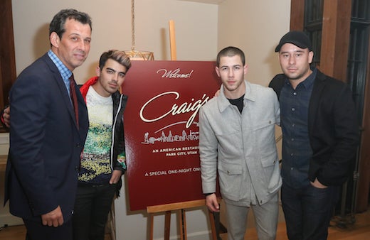 PARK CITY, UT - JANUARY 23: (L-R) Craig Susser,Joe Jonas,Nick Jonas and Phil McIntyre attend the Phil McIntyre And V Magazine Toast Nick Jonas And His Film "Goat" At A Special One Night Craig's Restaurant Pop-up In Sundance - 2016 Park Cityon January 23, 2016 in Park City, Utah. (Photo by John Parra/Getty Images)