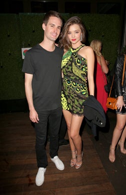 LOS ANGELES, CA - FEBRUARY 15: Entrepreneur Evan Spiegel (L) and Model Miranda Kerr attends the Republic Records Grammy Celebration presented by Chromecast Audio at Hyde Sunset Kitchen & Cocktail on February 15, 2016 in Los Angeles, California. (Photo by Imeh Akpanudosen/Getty Images for Republic Records)