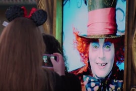 Johnny Depp Thrills Disneyland Guests With Mad Hatter Live Billboard Prank (Video)