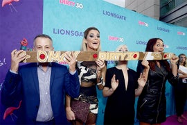 Grace Helbig, Mamrie Hart, Hannah Hart Serve Up a Naked Male Pizza-Roll Model at ‘Dirty 30’ Party