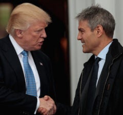 President-elect Donald Trump shakes hands with Ari Emanuel, co-CEO of William Morris Endeavor, on Sunday
