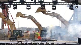 Watch Excavators Do Synchronized Dance at New Warriors’ Arena (Video)
